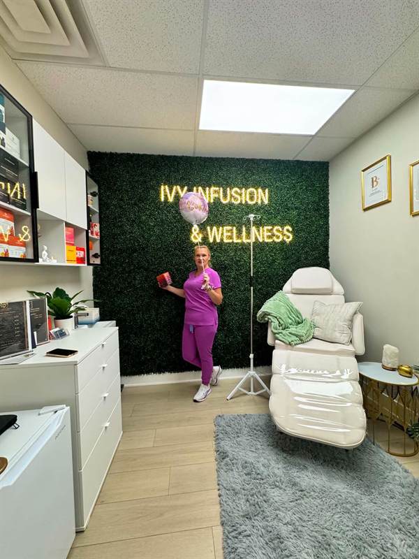 Treatment room at Ivy Infusion & Wellness with IV stand and reclining chair